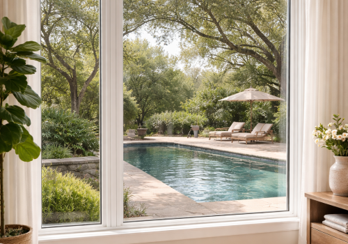 Energy-efficient windows overlooking a backyard pool in Dallas, TX